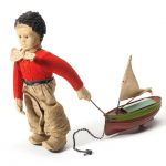 Bing walking boy with c/w tinplate toy boat, circa 1908